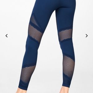 Fabletics NAVY seamless 7/8 leggings; supportive ribbed waistband & mesh panels.